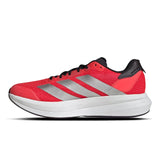 Red running shoe with three silver stripes on a white background