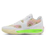 White sneaker with green sole on a white background