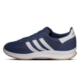 Navy blue and white Adidas sneaker on a white background