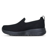 Black slip-on sneaker on a white background