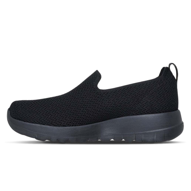 Black slip-on sneaker on a white background