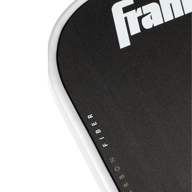 Close-up of a black paddle with 'Frank' branding on a white background