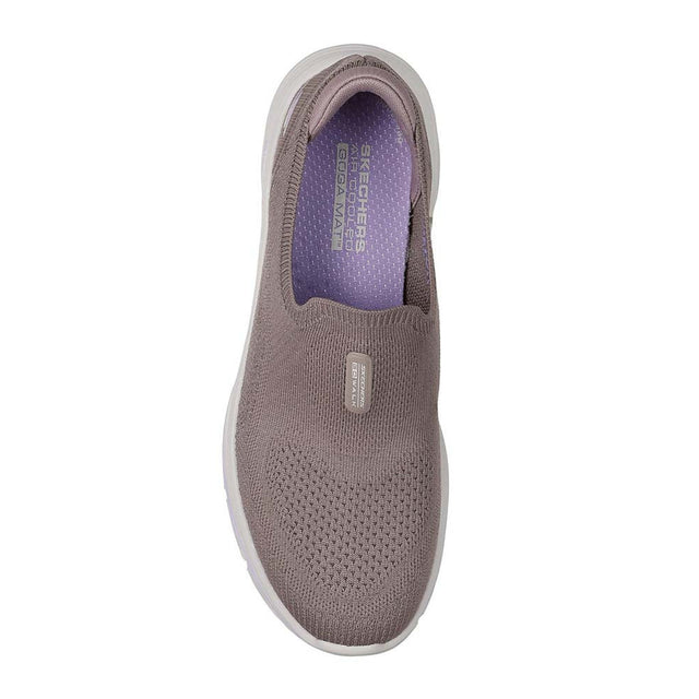 Gray slip-on shoe with white sole on a white background