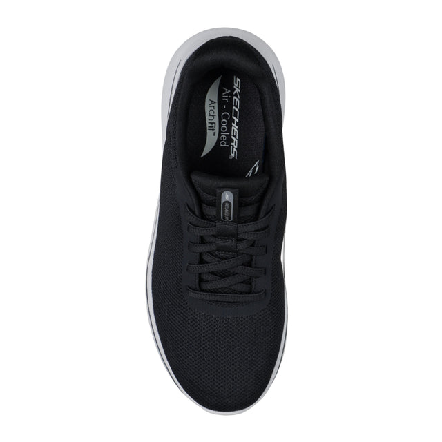 Black sneaker with white sole on a white background