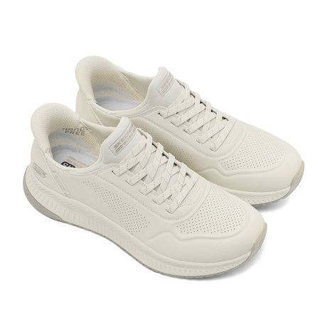 White sneakers on a white background