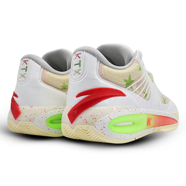 White sneakers with red and green accents on a white background