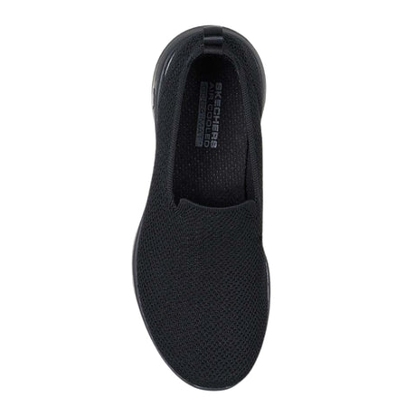 Black slip-on shoe with 'Skechers' branding on a white background
