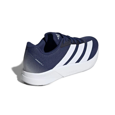 Navy blue athletic shoe with white stripes on a white background