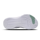 White sneaker sole with green accent on a white background