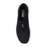 Black slip-on sneaker with white sole on a white background