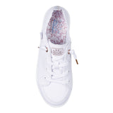 White sneaker with floral lining on a white background