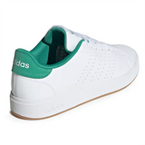 White Adidas sneaker with green accents on a white background
