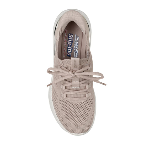 Beige sneaker with lace-up design on a white background