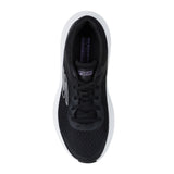 Black sneaker with white sole on a white background