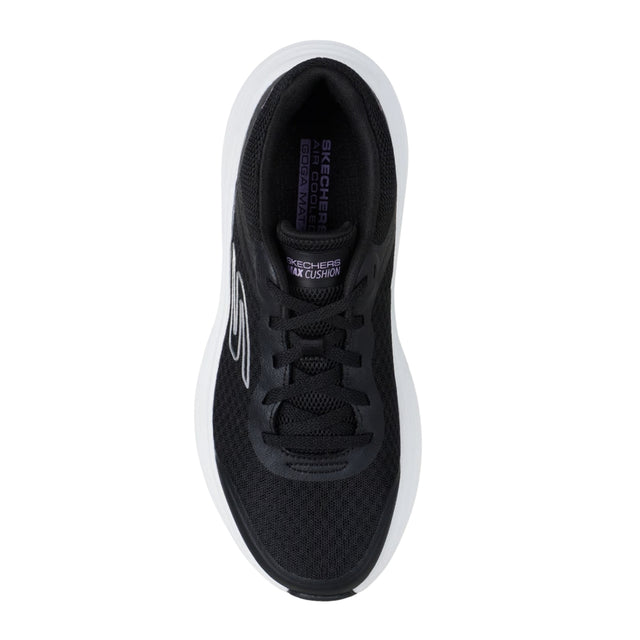 Black sneaker with white sole on a white background