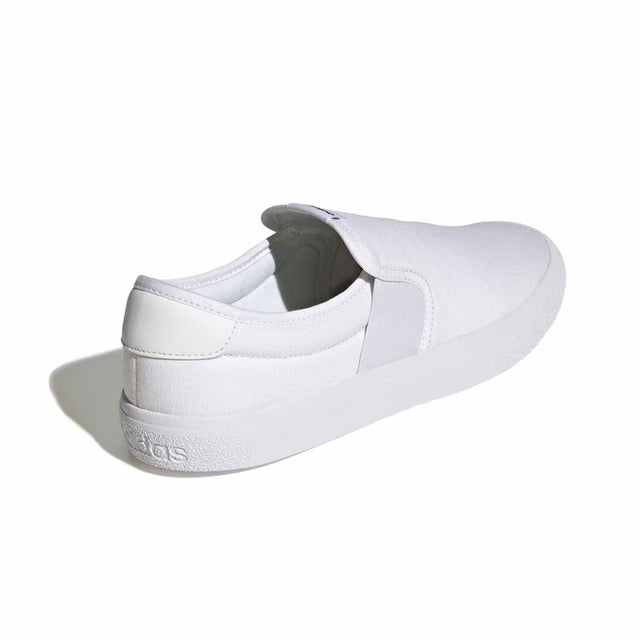 White slip-on sneaker with Adidas logo on a white background