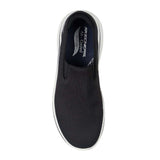 Black slip-on sneaker with 'Skechers' branding on a white background