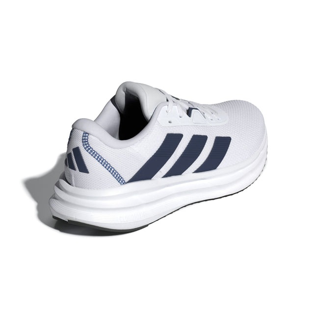 White athletic shoe with blue stripes on a white background