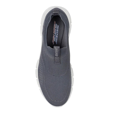 Gray slip-on sneaker with white sole on a white background