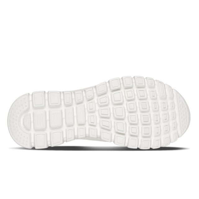 White shoe sole with textured pattern on a white background