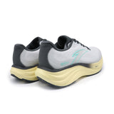 Pair of running shoes with gray, black, and beige color scheme on a white background