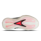 White athletic shoe with pink sole and black swoosh logo on a white background