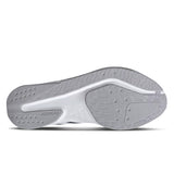 Close-up of a gray athletic shoe sole with 'Adiwear' branding on a white background