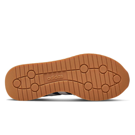 Brown Adidas sole on a white background