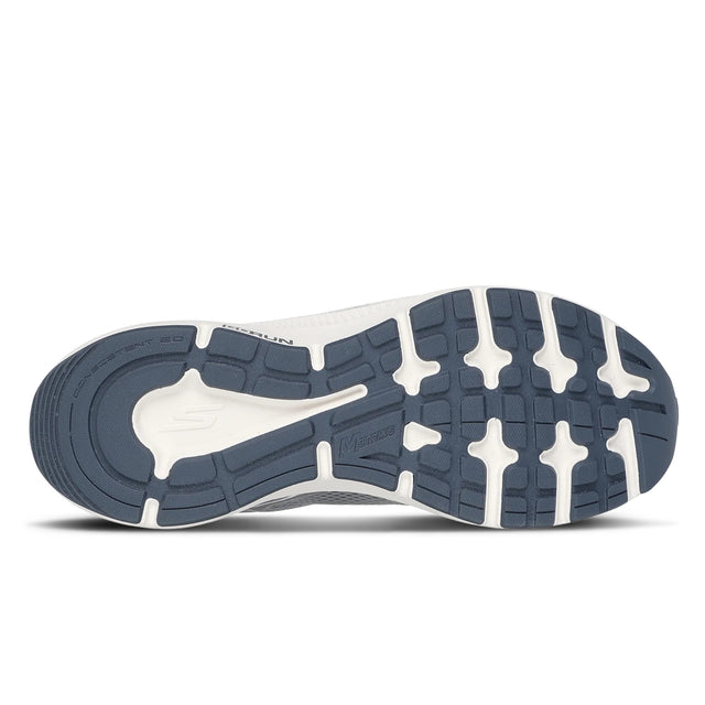 Navy and white shoe sole on a white background