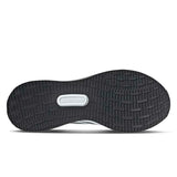 Black shoe sole with tread pattern on a white background