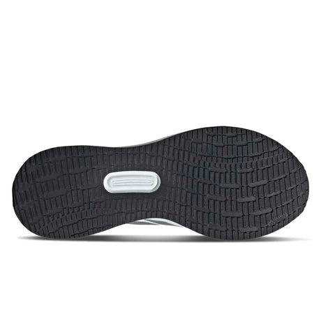 Black shoe sole with tread pattern on a white background