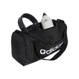 Black Adidas duffel bag with a water bottle on a white background