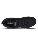 Black sneaker with Skechers branding on a white background