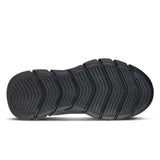 Black sandal sole with tread pattern on a white background