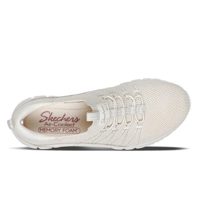 White sneaker with 'Skechers' branding on a white background
