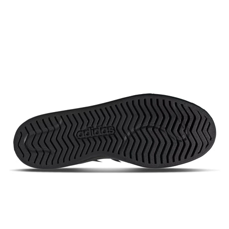 Black Adidas shoe sole on a white background