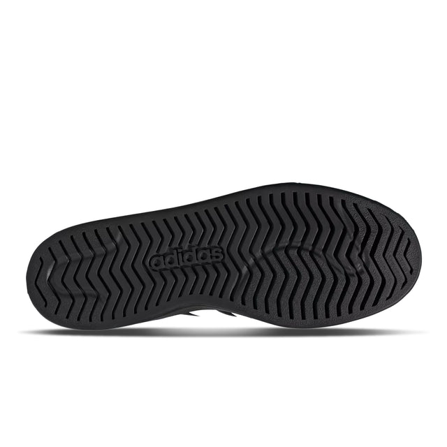 Black Adidas shoe sole on a white background