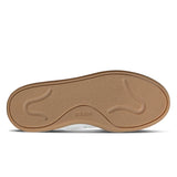 Brown shoe sole with Adidas logo on a white background