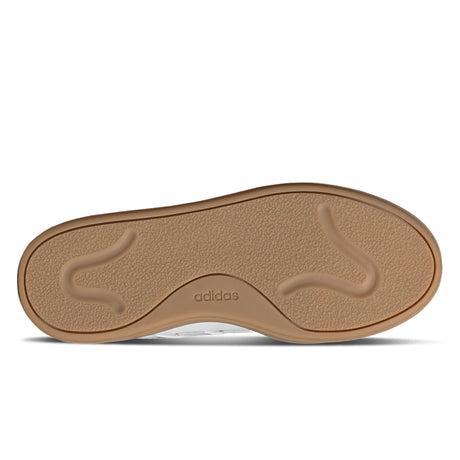 Brown shoe sole with Adidas logo on a white background