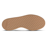 Brown shoe sole with Adidas logo on a white background