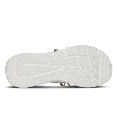White sandal sole with textured pattern on a white background