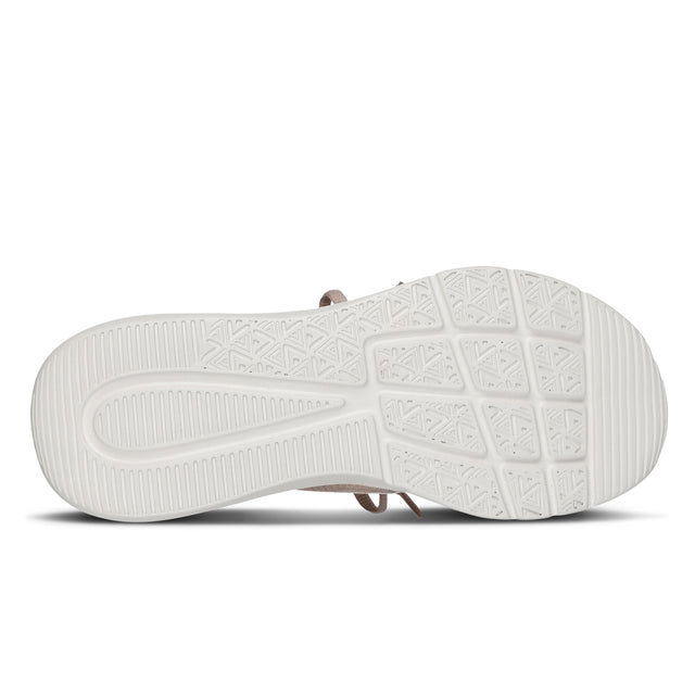 White sandal sole with textured pattern on a white background