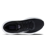 Black sneaker with white sole on a white background