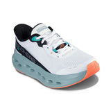 White running shoe with orange sole and blue sole on a white background