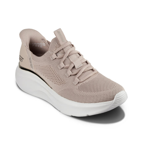 Beige sneaker with white sole on a white background