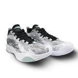 White and black sneakers with camouflage pattern on a white background