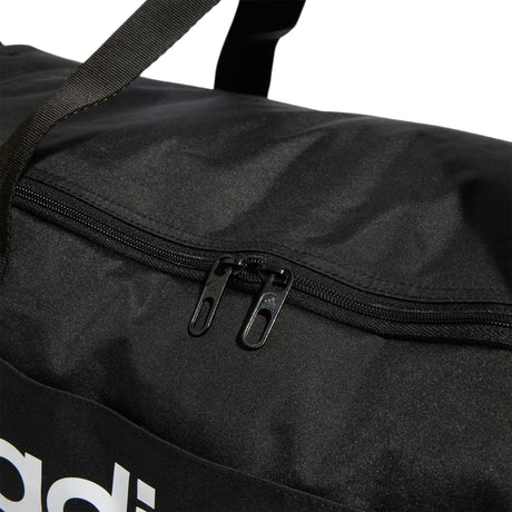 Black duffel bag with a visible brand logo on a white background