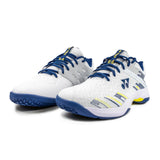 White sports shoes with blue and yellow accents on a white background