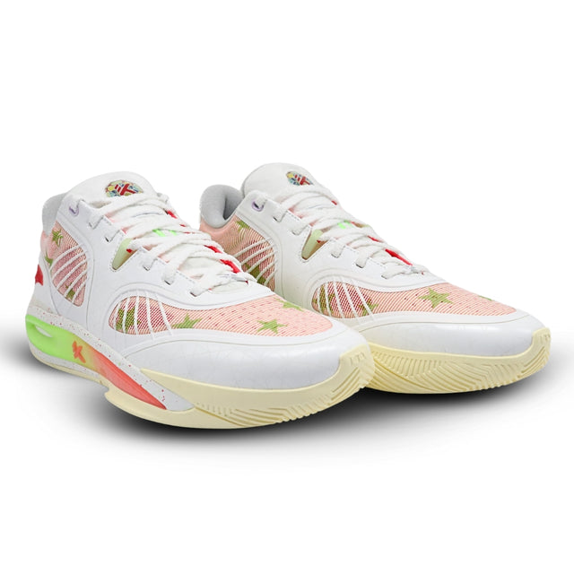 White sneakers with colorful patterns on a white background