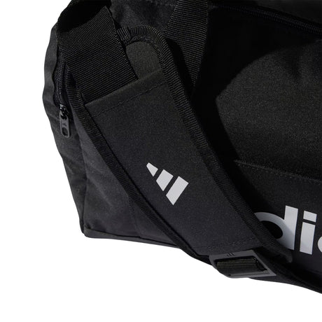 Black waist bag with Adidas logo on a white background